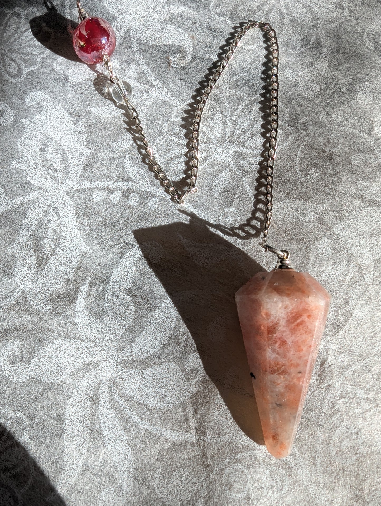 PENDULUM - Sunstone  with red bead