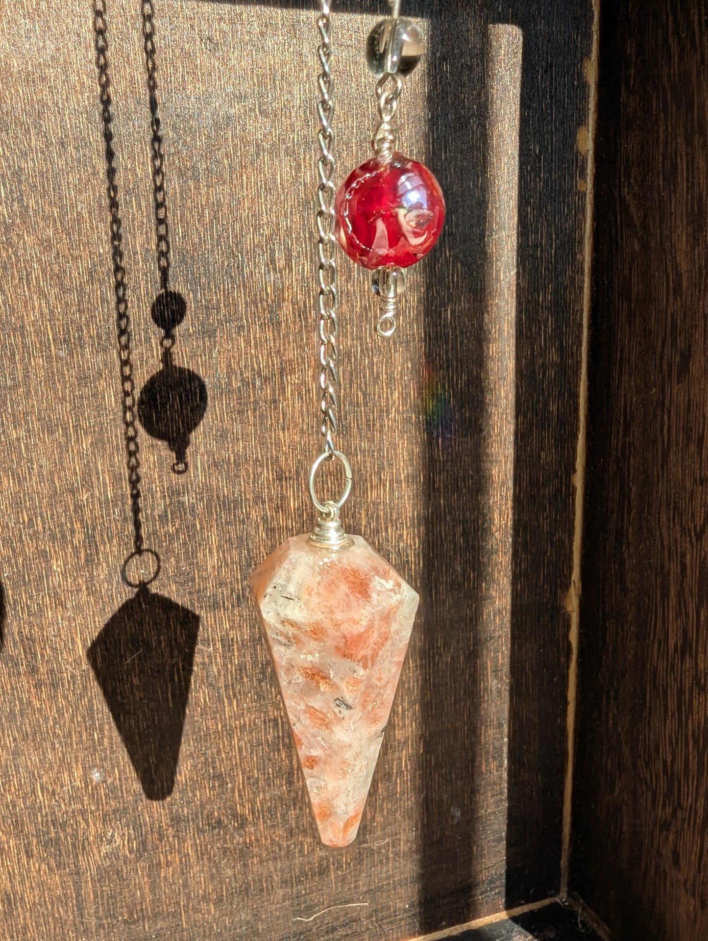 PENDULUM - Sunstone  with red bead