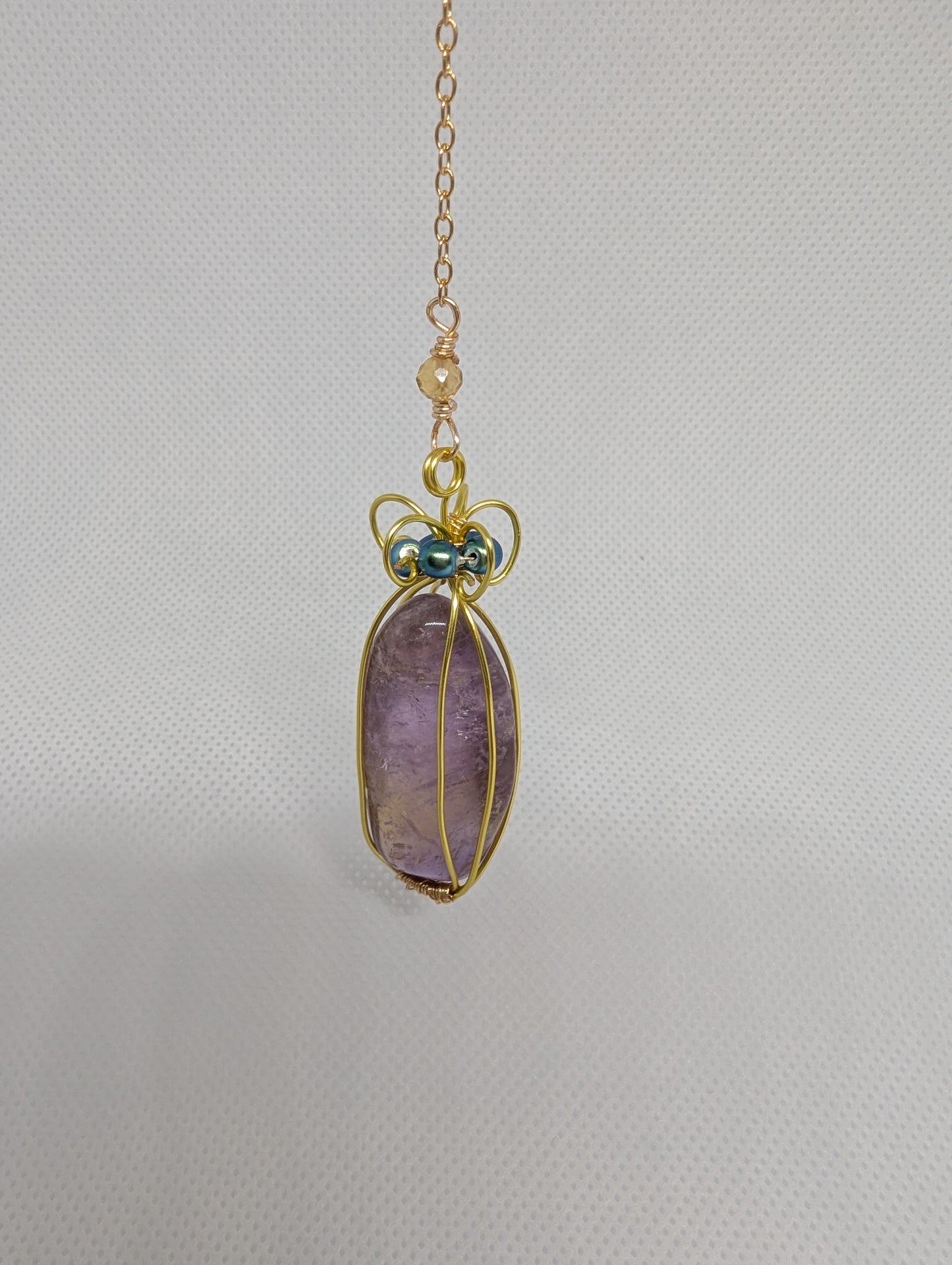 PENDULUM - Anetrine (amethyst & citrine) wrapped with Gold-colored wire